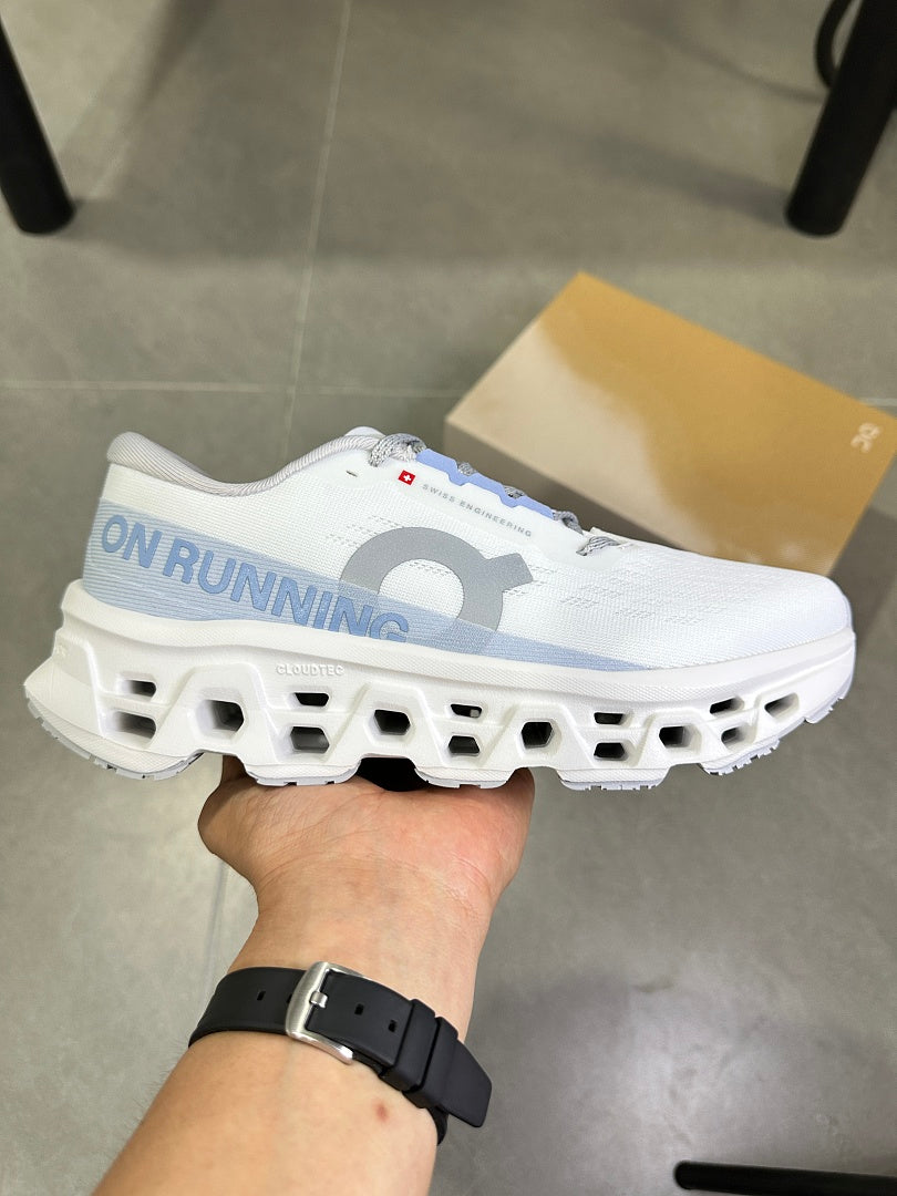 On Running Cloudsurfer Next Running Shoes in White Blue - product image from the listing.