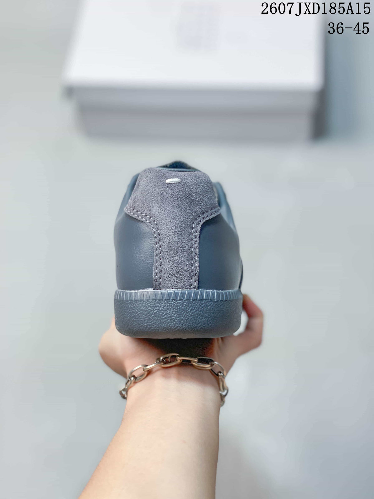 Maison Margiela S57WS0236 Low-Top Sneakers in Gray - product image from the listing.