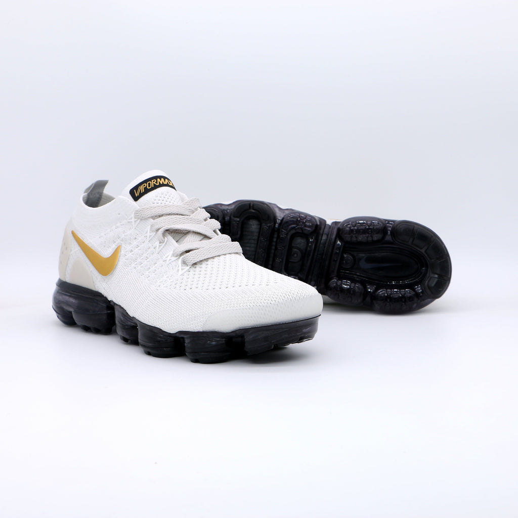Nike Air VaporMax Flyknit Sneakers in White Gold Black 942842-010 - product image from the listing.