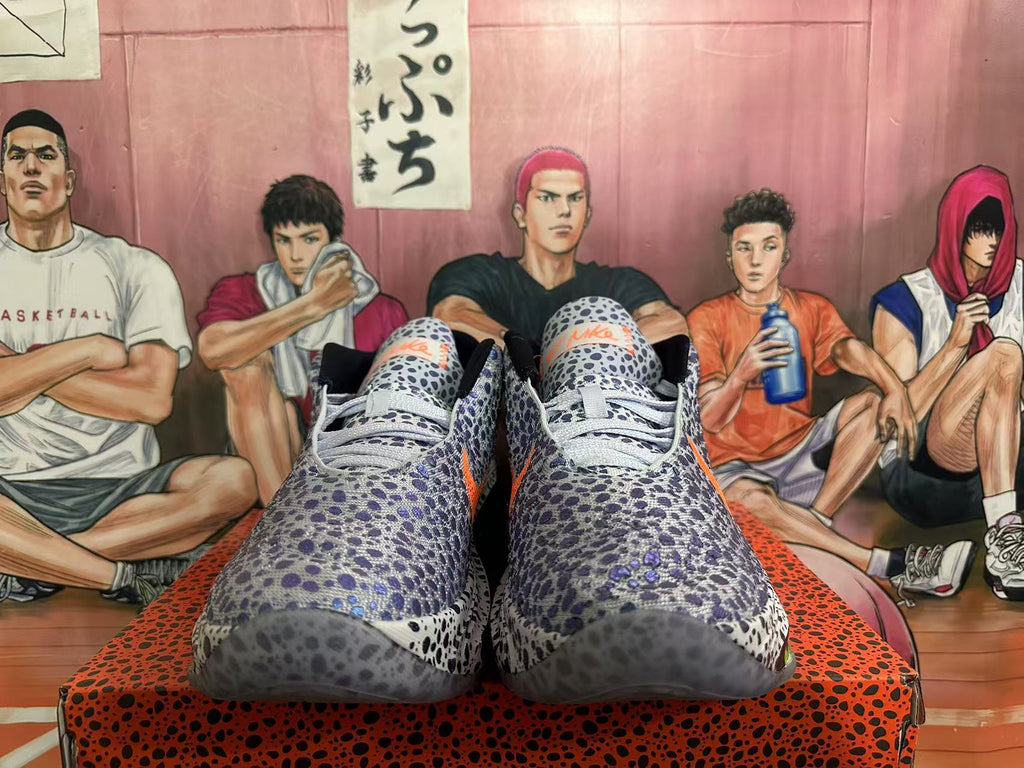 Nike Basketball Footwear, Gray and Orange Speckled Design - product image from the listing.