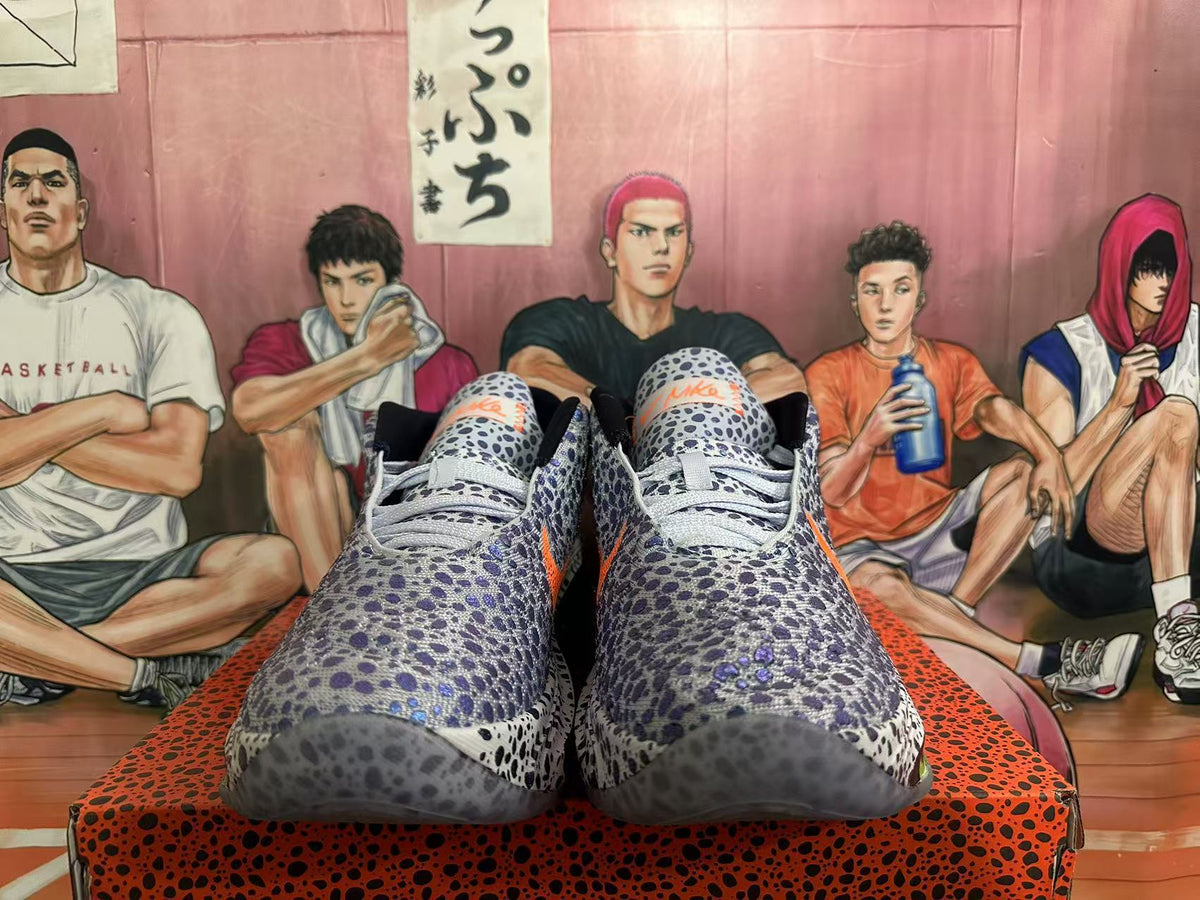 Nike Basketball Footwear, Gray and Orange Speckled Design - product image from the listing.