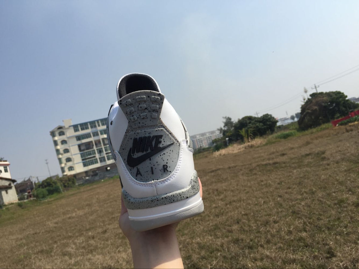 Men's Jordan 4 Retro White Cement Sneakers - product image from the listing.