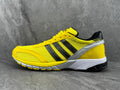 adidas Yellow Mesh Low-Cut Sneakers with Three Stripes - product image from the listing.