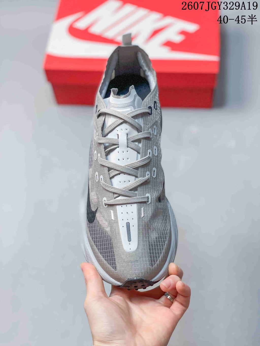 Nike Ava X Rover Low-Top Running Sneakers in Gray - product image from the listing.