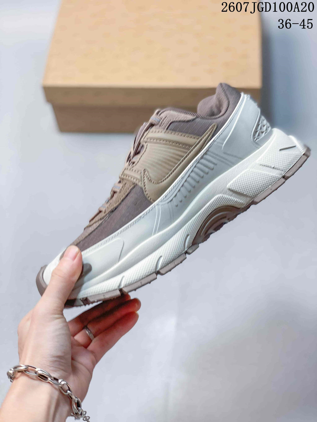 Nike Zoom Vomero Roam Sneakers in Taupe Gray 2607JGD100A20 - product image from the listing.