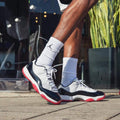 Concord Bred - Jordan 11 Retro Low - product image from the listing.