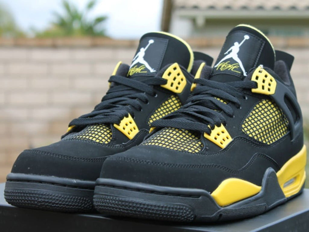 Thunder (2023) - Jordan 4 Retro - product image from the listing.