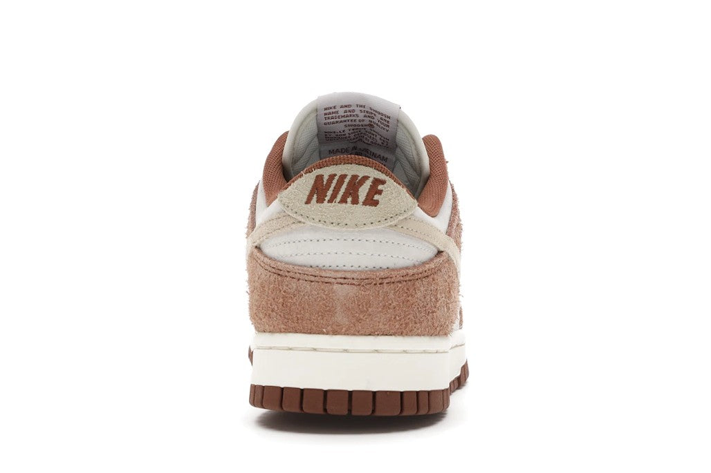 Dunk Low Medium Curry by Nike - product image from the listing.