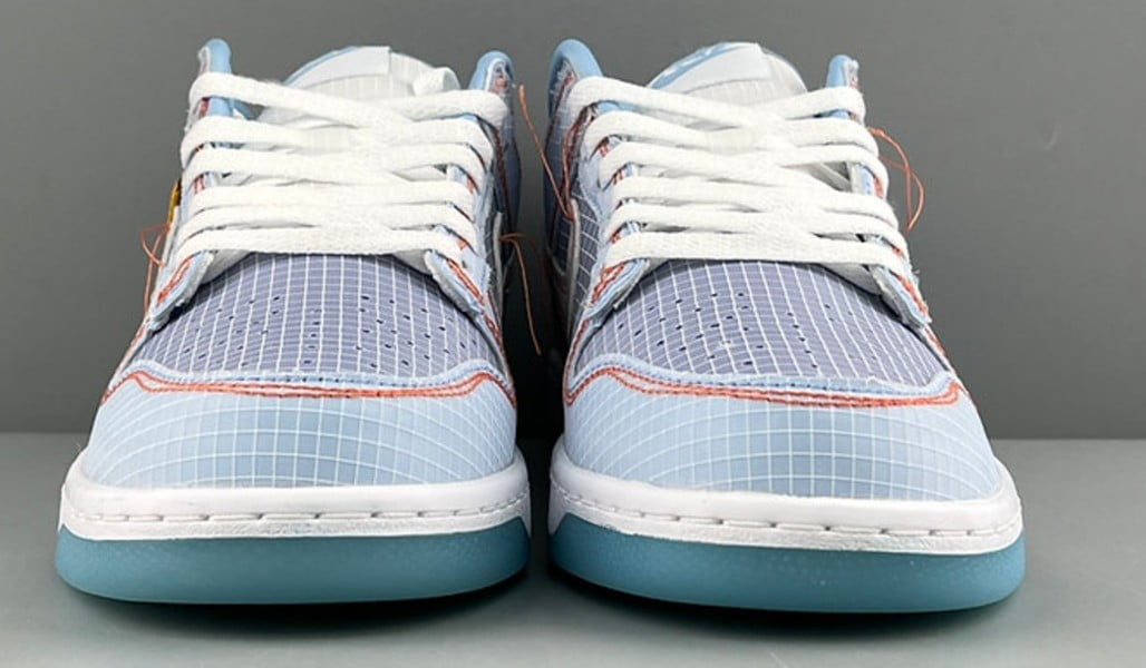 Dunk Low Union Passport Pack Argon by Nike - product image from the listing.