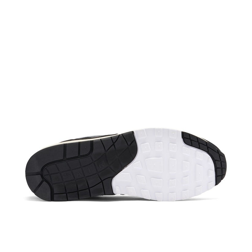 With Bracelet - Patta x Nike Air Max 1 Black White - product image from the listing.