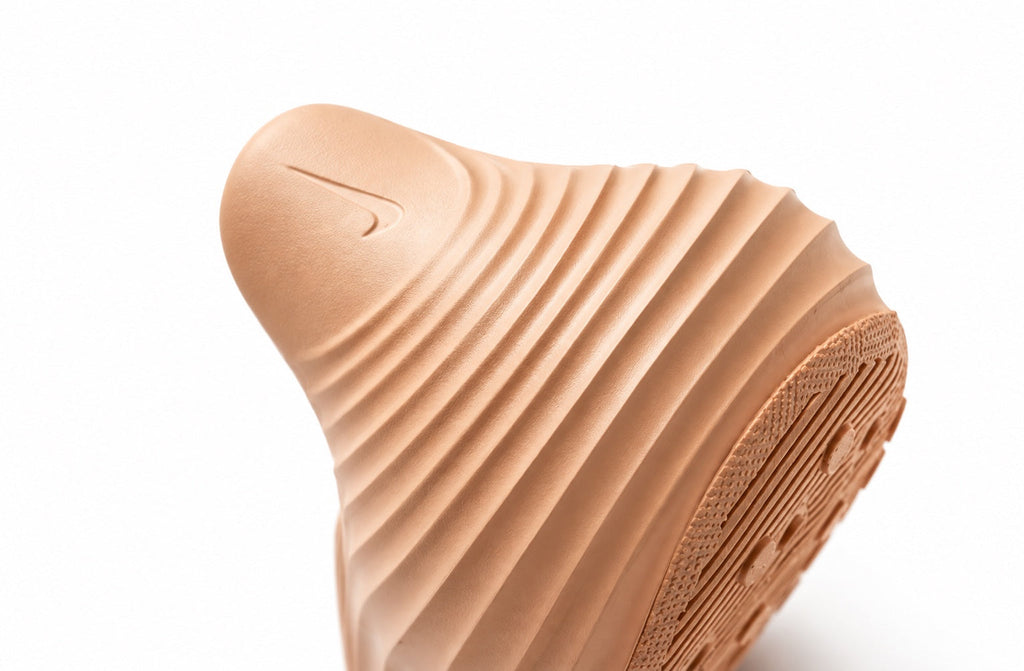 "Rose Gold" Nike ReactX Rejuven8 - product image from the listing.