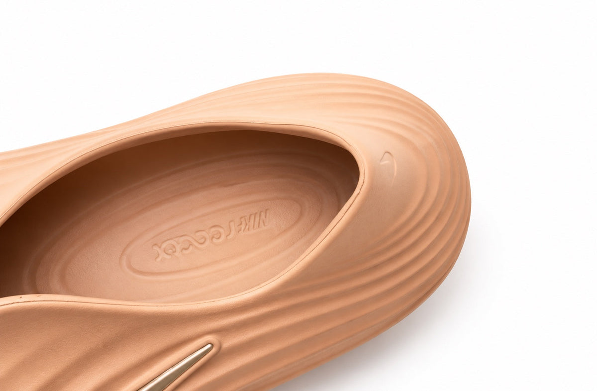 "Rose Gold" Nike ReactX Rejuven8 - product image from the listing.