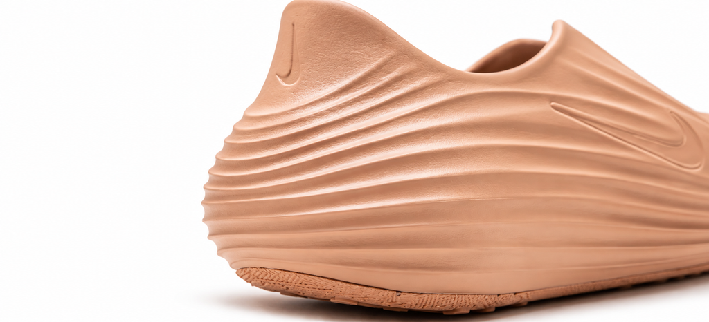 "Rose Gold" Nike ReactX Rejuven8 - product image from the listing.