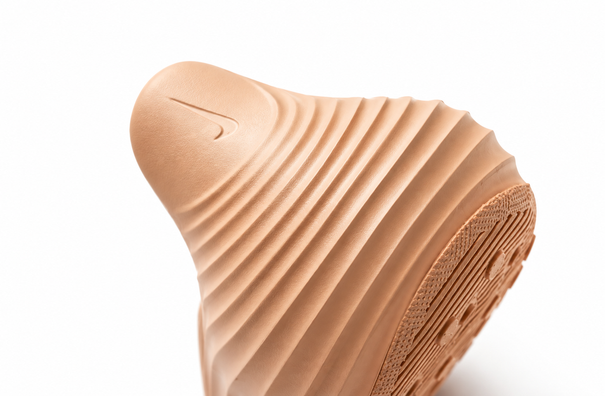 "Rose Gold" Nike ReactX Rejuven8 - product image from the listing.